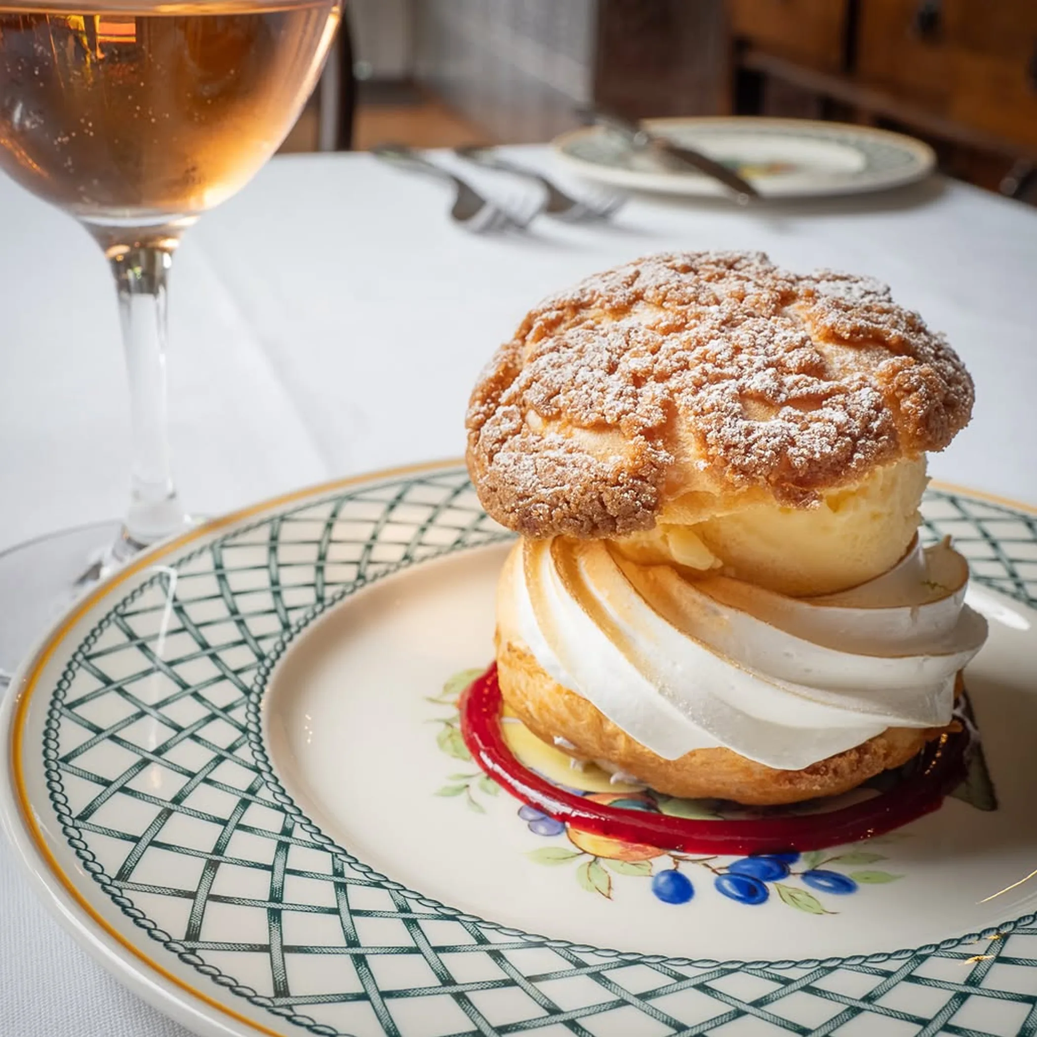 celebratory plated dessert with matched wine