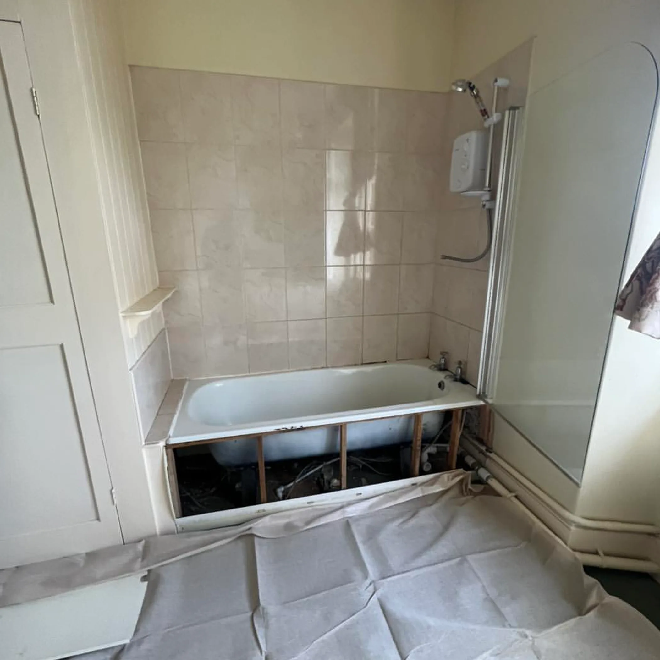exposed plumbing and bathtub maintenance